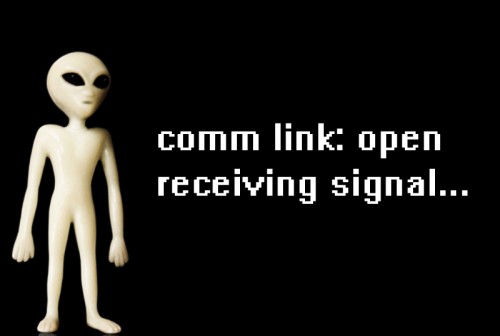 Alien with computer text